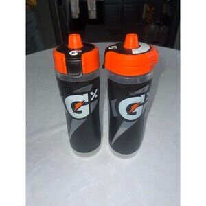 2 Gatorade water bottle -1 has sharpie on top & a few scrapes on spout